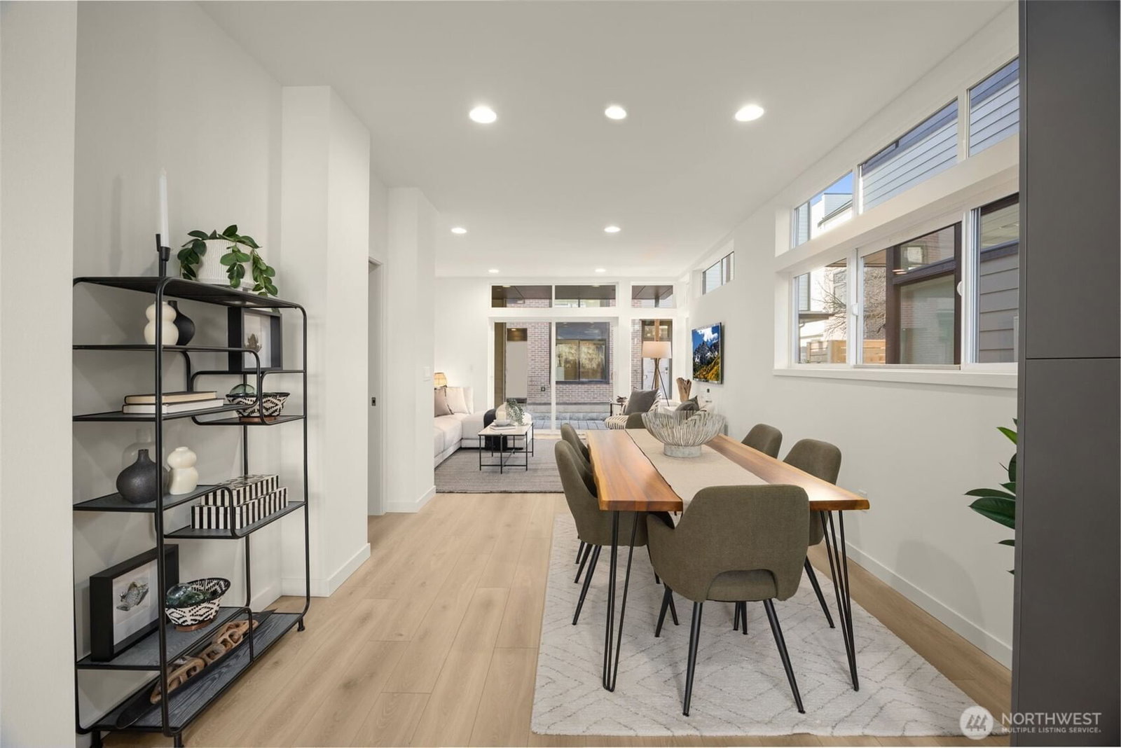 Dining beside the kitchen, open to the living room