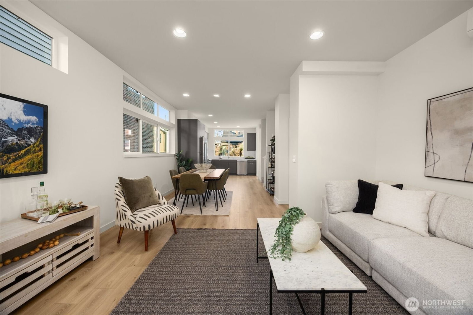 Living, dining and kitchen on one open second floor